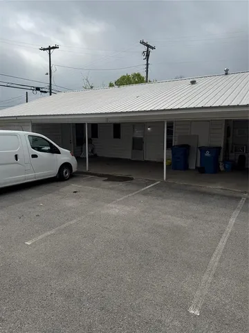 a view of a house with a garage