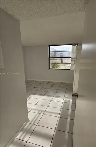 a view of a garden with an outdoor space