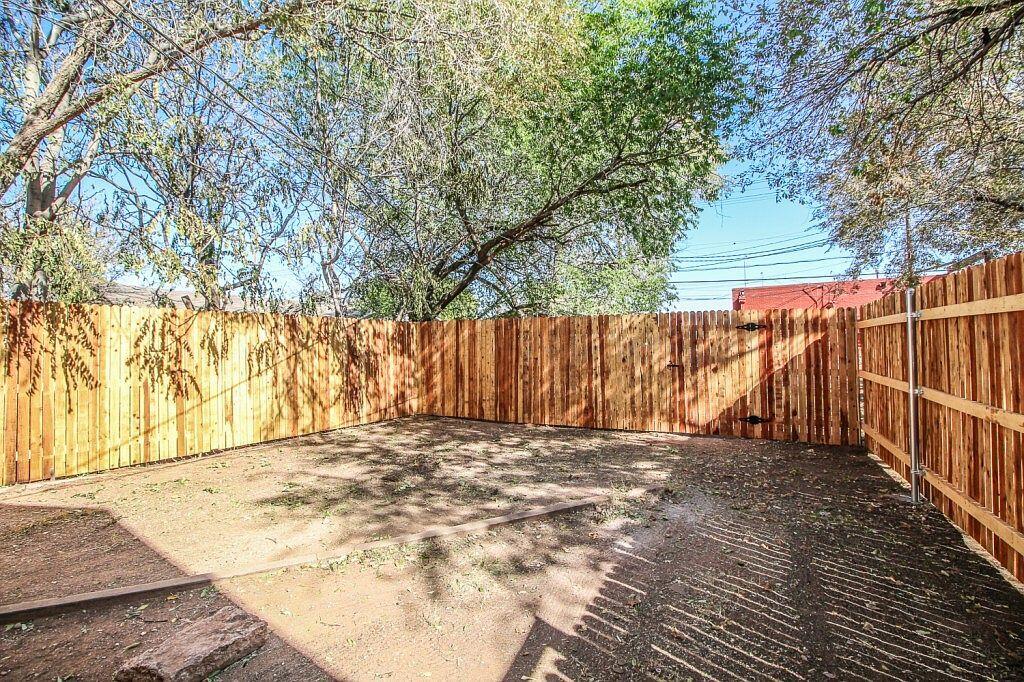1805 Avenue R Lubbock, TX 79401 - Photo 18 of 18 a view of outdoor space with wooden fence