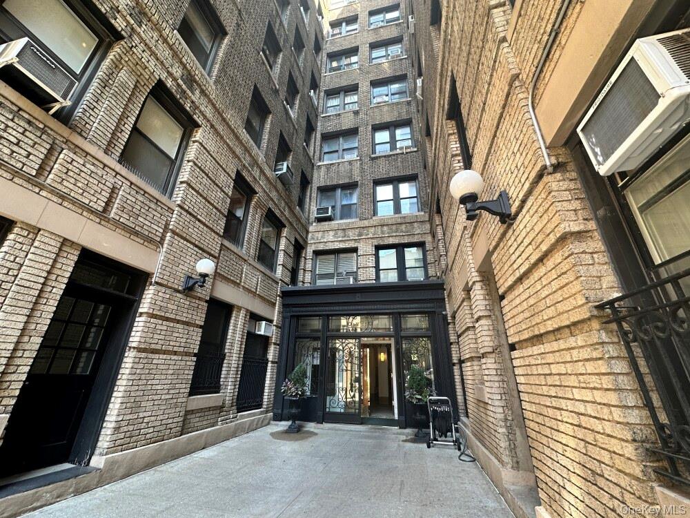 203 West 81st Street, Unit 4E Manhattan, NY 10024 - Photo 15 of 17 a view of a building with a door