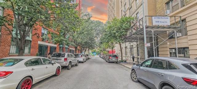 203 West 81st Street, Unit 4E Manhattan, NY 10024 - Photo 3 of 17 a view of a cars park in front of a building