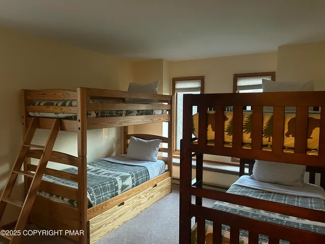 a view of a living room and entryway