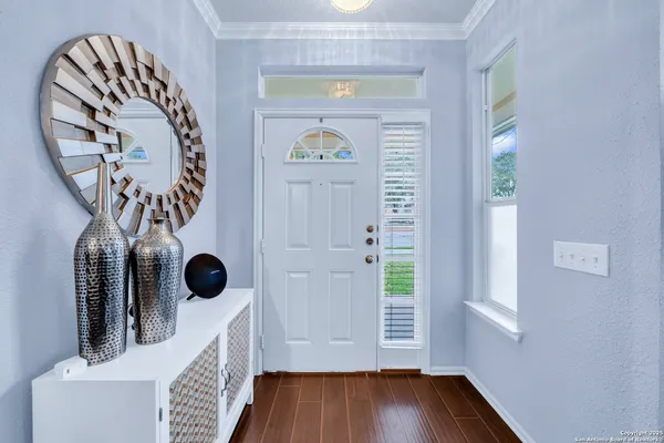 a view of entryway with wooden floor