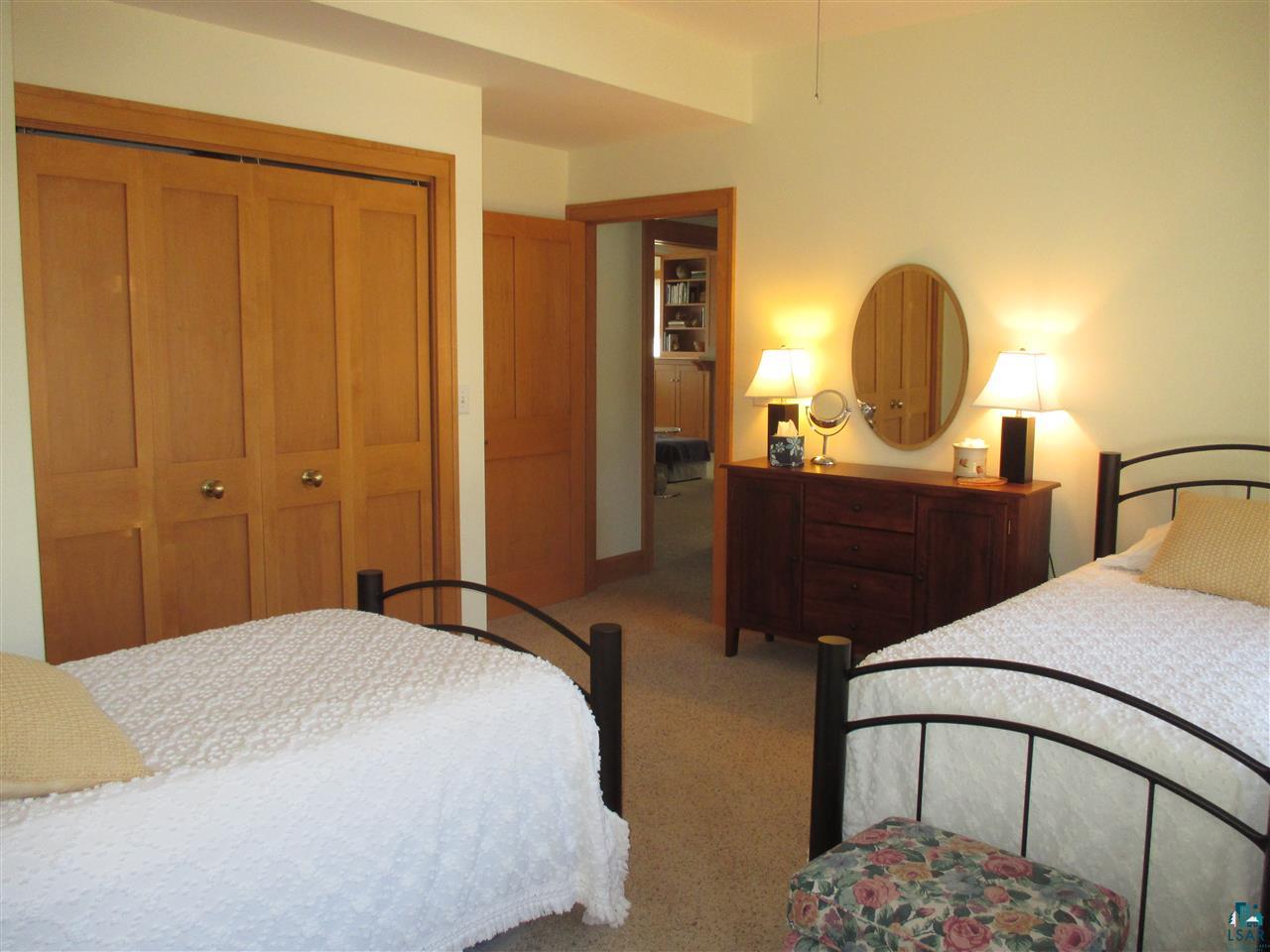 37433 Apostle Bay Road Bayfield, WI 54814 - Photo 19 of 49 Close off bedroom & full bath for private suite on main level.