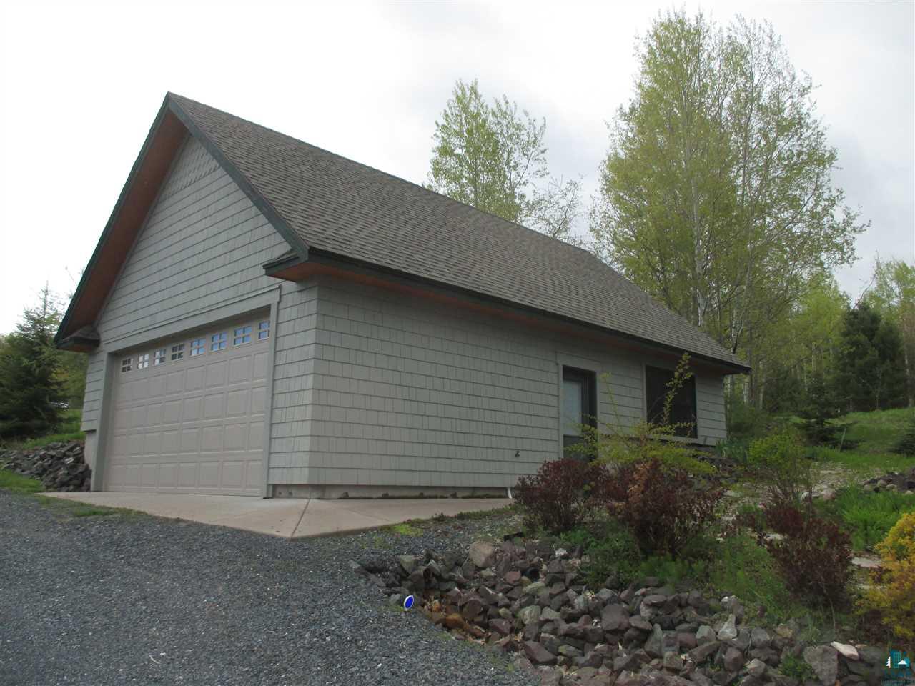 37433 Apostle Bay Road Bayfield, WI 54814 - Photo 37 of 49 34' x 24' with poured foundation + upper storage space, perennial garden.