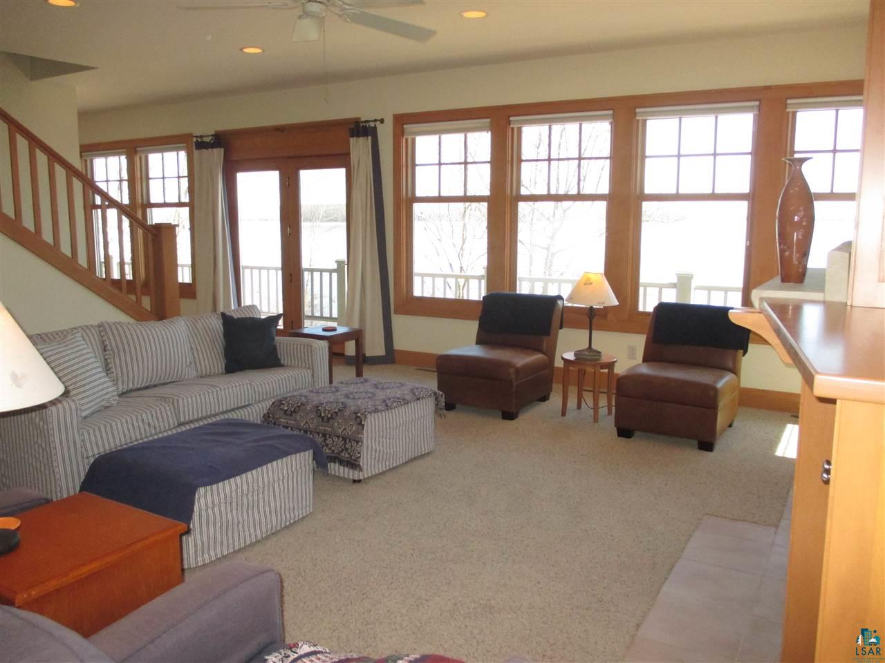 37433 Apostle Bay Road Bayfield, WI 54814 - Photo 6 of 49 Flows to dining area, kitchen & upstairs.