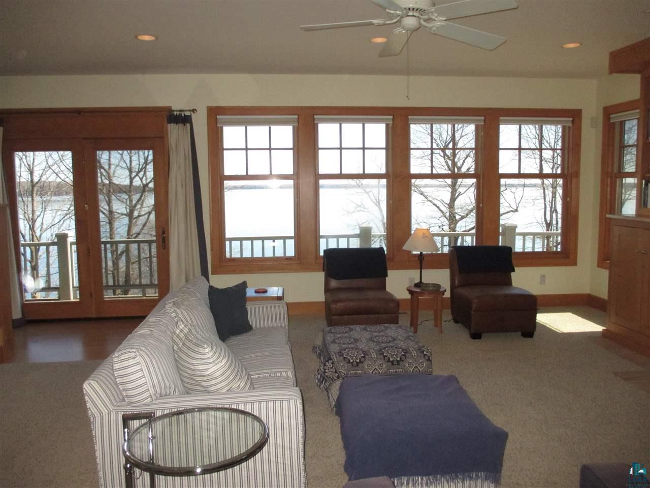 37433 Apostle Bay Road Bayfield, WI 54814 - Photo 7 of 49 Lakeside deck access, windows on two sides.
