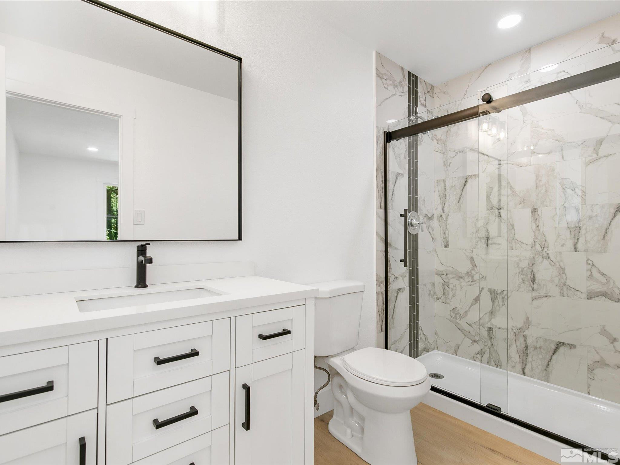 421 Edgewood Drive Stateline, NV 89449 - Photo 20 of 29 a bathroom with a sink a toilet and shower