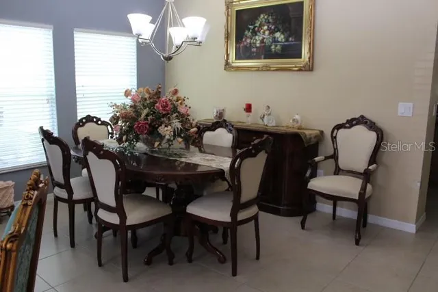 a kitchen with granite countertop a sink and a stove