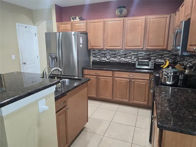 a living room with furniture and window