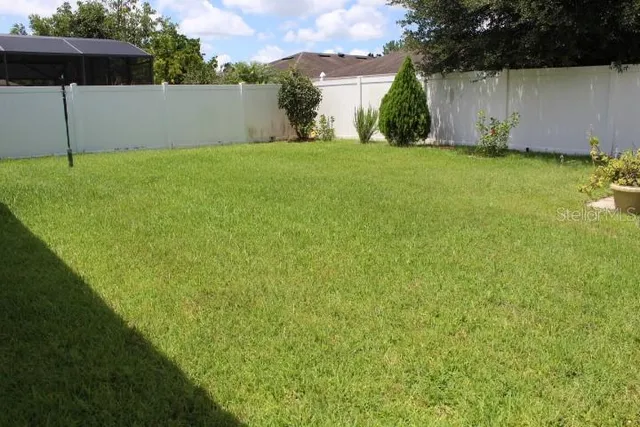 a view of a house with a swimming pool