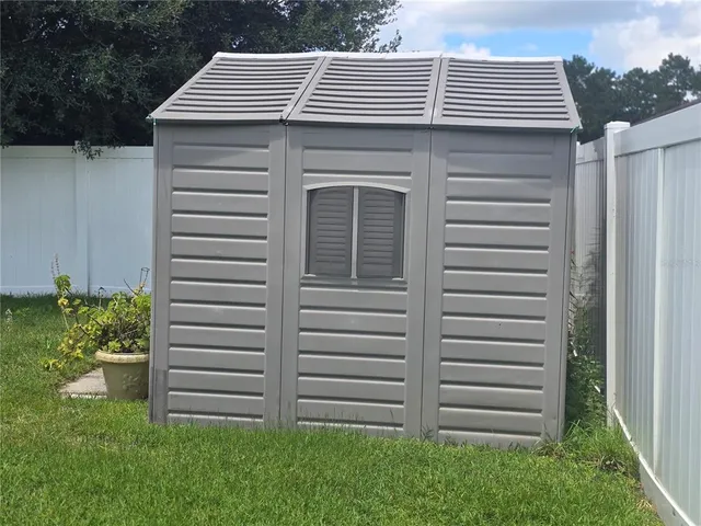 a view of a lake in between the sunset