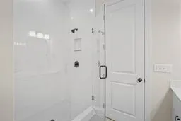 a view of a room with racks on the wall