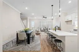 a very nice looking dining room with a table and chairs
