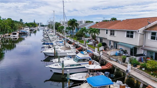 a view of a chairs and table in a patio