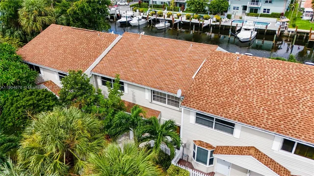 an aerial view of a house with outdoor space