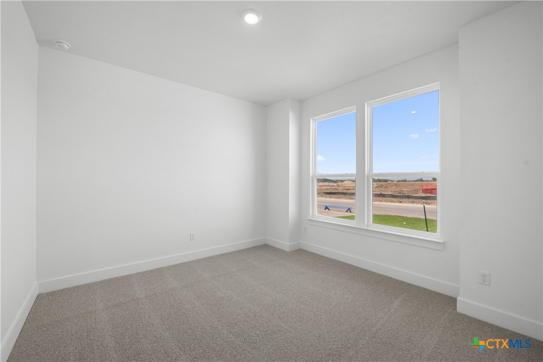 1803 Bear Grass Rdg Road Temple, TX 76501 - Photo 10 of 16 an empty room with a window