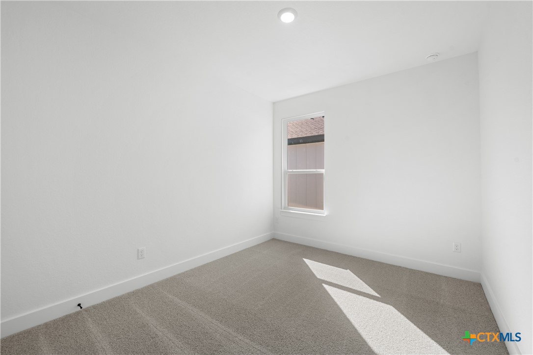 1803 Bear Grass Rdg Road Temple, TX 76501 - Photo 11 of 16 a view of an empty room with a window