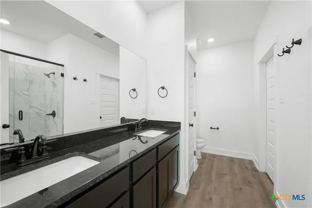 a kitchen with a sink and a stove