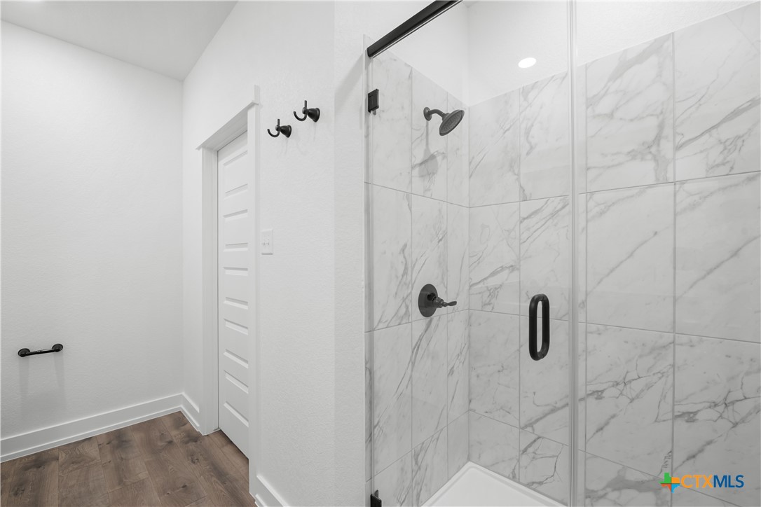 1803 Bear Grass Rdg Road Temple, TX 76501 - Photo 8 of 16 a bathroom with a shower