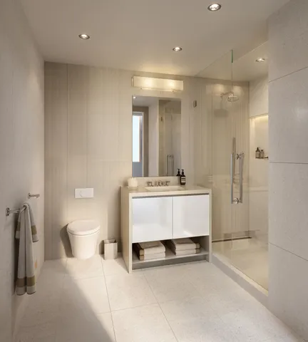 a bedroom with furniture and a large window