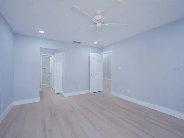 a view of an empty walk in closet