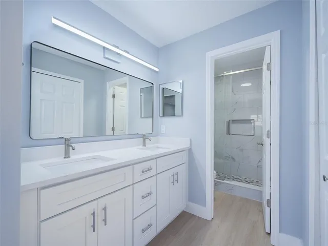 a bathroom with a shower and a toilet