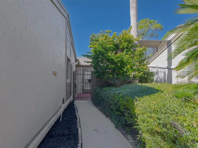a view of a pathway in outside of the house