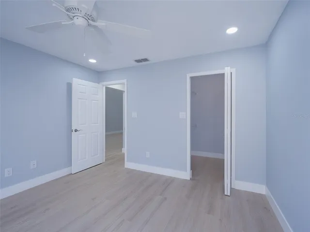 a view of a room with racks on the wall