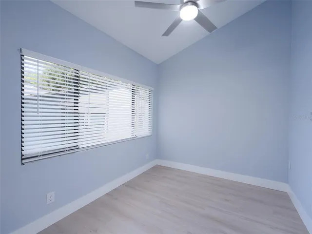 a view of a livingroom with wooden floor