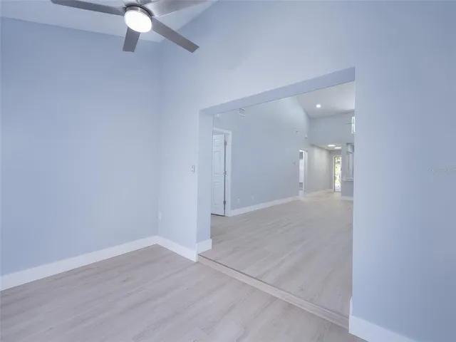 a view of a room with a hallway