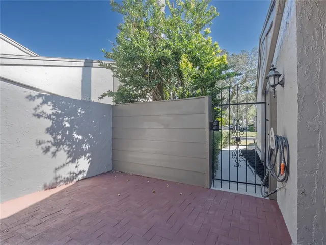 a kitchen with stainless steel appliances white cabinets and a stove