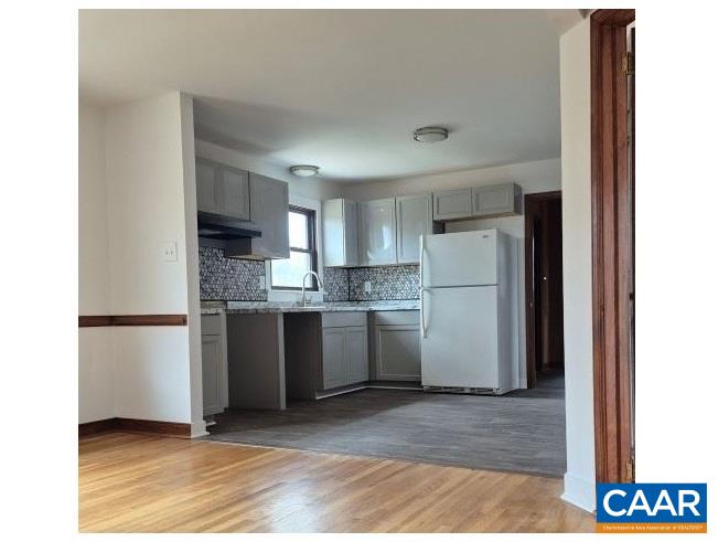 2807 Moyer Road Powhatan, VA 23139 - Photo 2 of 15 a kitchen with a refrigerator and a sink