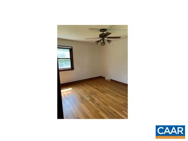 a picture of a bench in a room