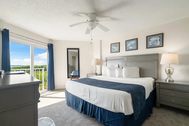 a kitchen with stainless steel appliances granite countertop a sink refrigerator and microwave