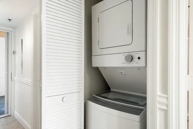 a view of a lake with outdoor seating