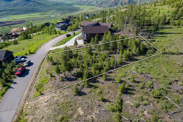 a view of a garden with a yard