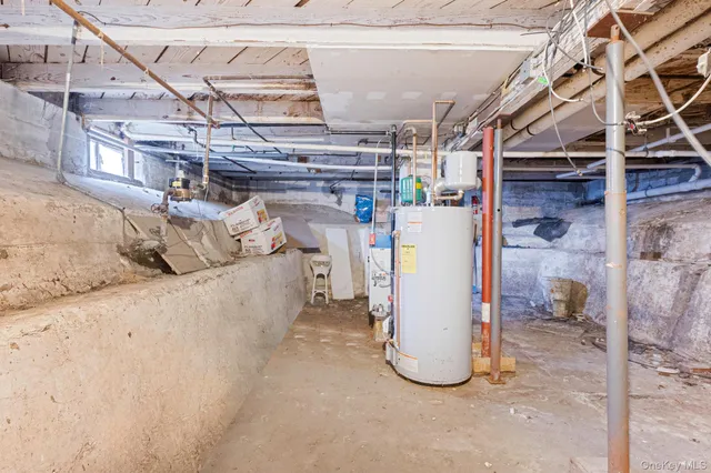 a view of a storage & utility room with a sink