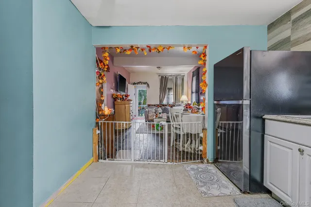 a view of a living room and a garage