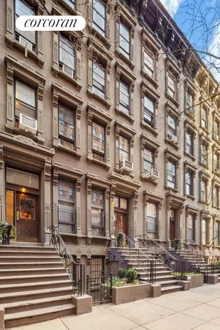 a view of a backyard with sitting area