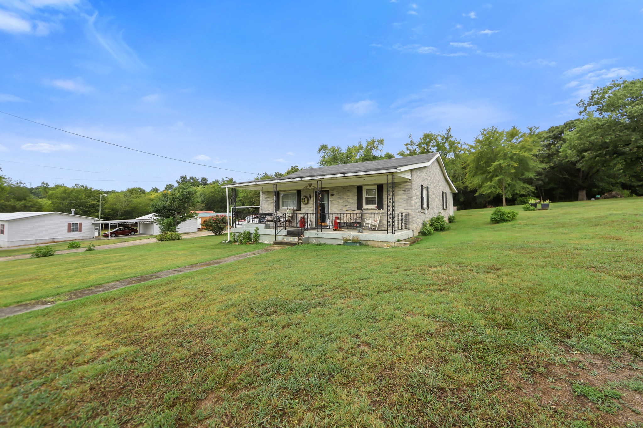 124 Shipper Road Lebanon, TN 37087 - Photo 2 of 29 a view of a house with a big yard