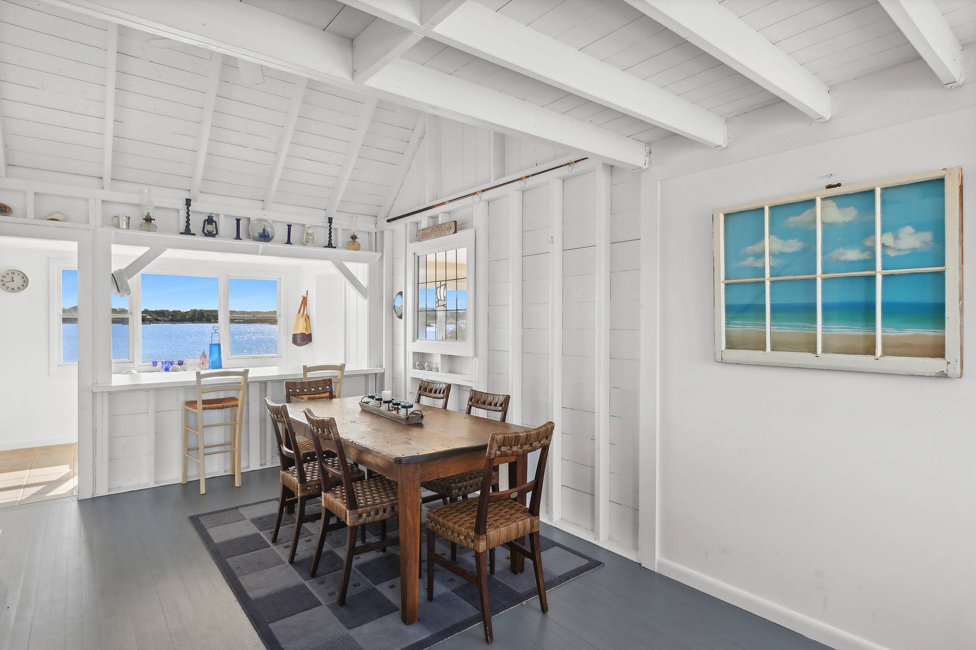 238 Towd Point Road Southampton, NY 11968 - Photo 12 of 34 a view of a dining room with furniture and window