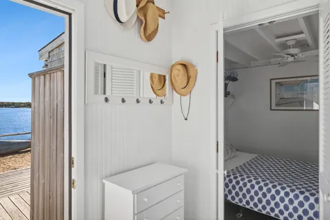 a bathroom with a shower and a sink