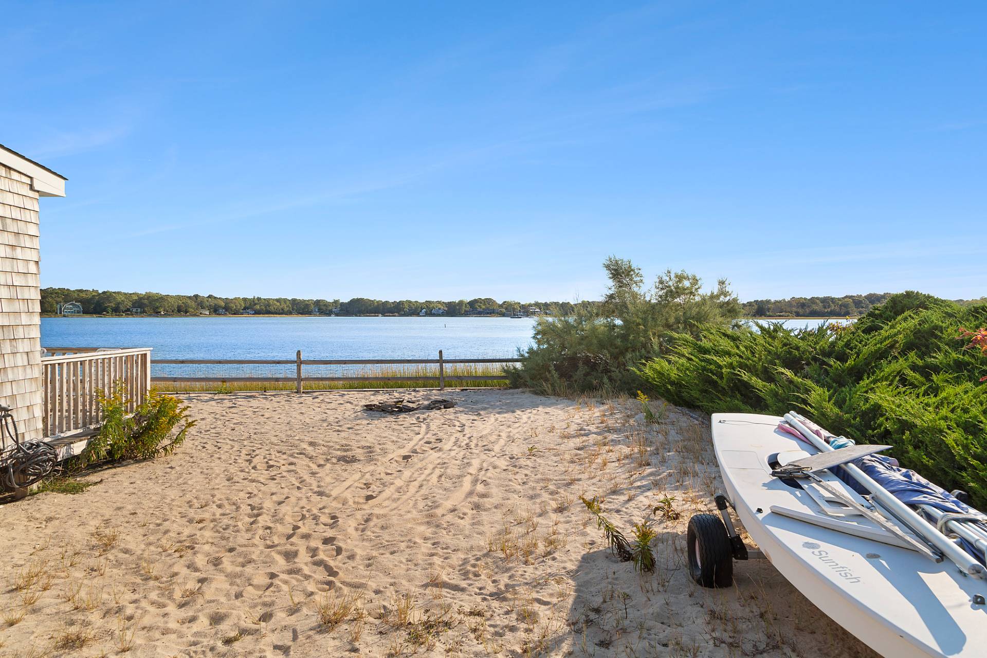 238 Towd Point Road Southampton, NY 11968 - Photo 21 of 34 a view of a lake with beach and city view