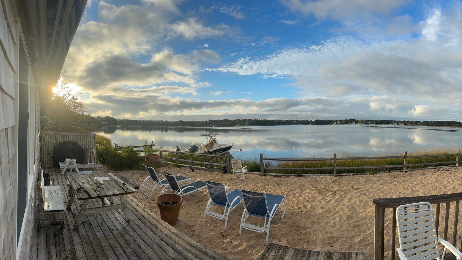 238 Towd Point Road Southampton, NY 11968 - Photo 34 of 34 a view of a lake with outside seating space