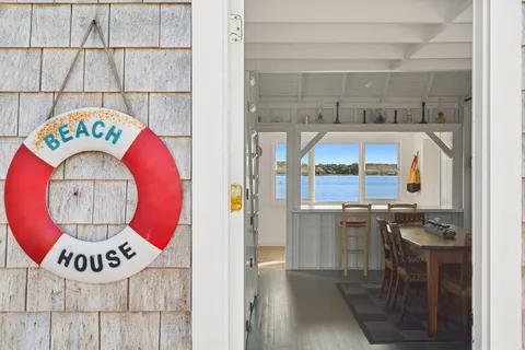 a kitchen with a stove and a refrigerator