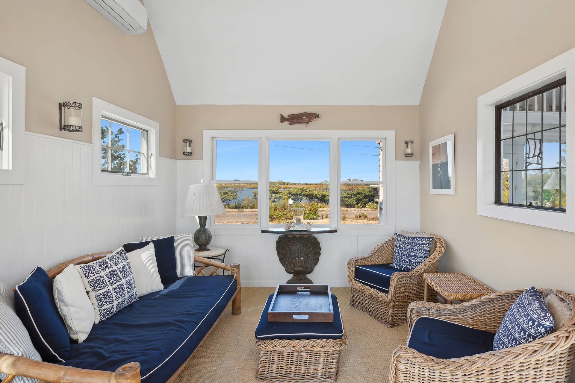 238 Towd Point Road Southampton, NY 11968 - Photo 8 of 34 a living room with furniture and a large window
