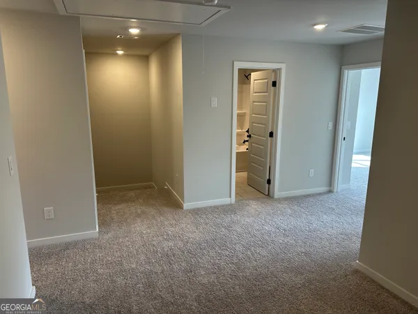 a bathroom with a sink and mirror