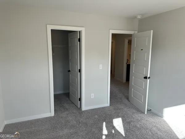 a front view of a building with garden