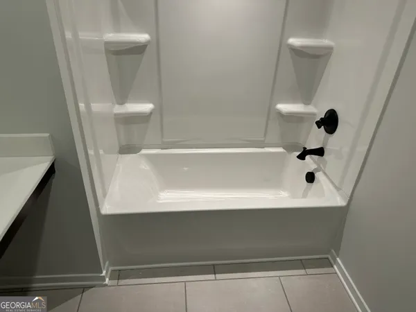 a view of a room with a large window